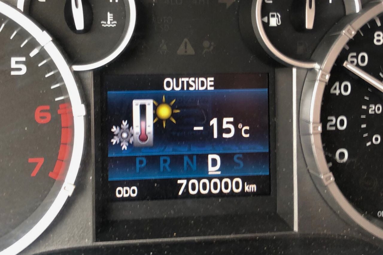 A close-up of a Toyota Tundra odometer that shows 700,000km.